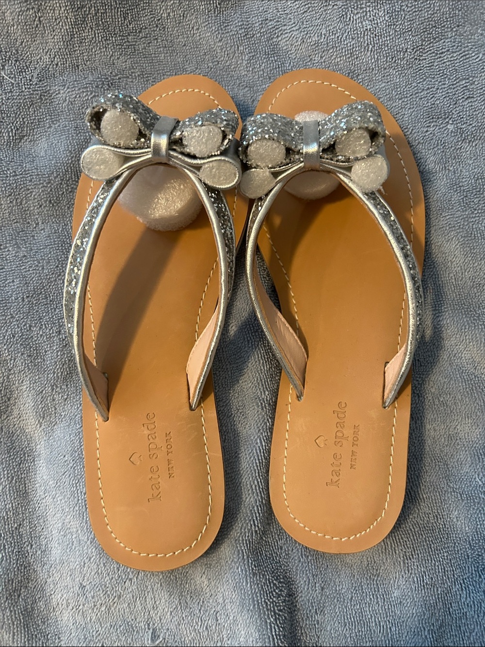 kate spade New York Silver Glitter Bow Thong Sandals
